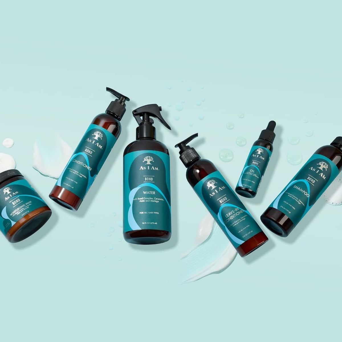 As I Am Bond hårplejeserie med shampoo, balsam, leave-in, olie, maske og water spray på turkis baggrund.