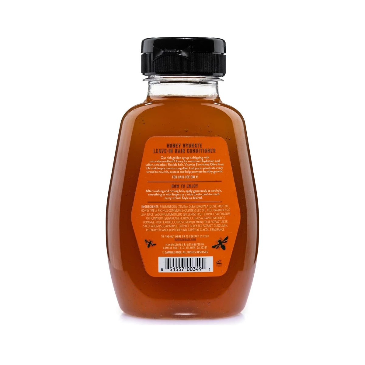 Camille Rose Honey Hydrate Leave-In Hair Conditioner i klar flaske med sort skruelåg og orange etiket.